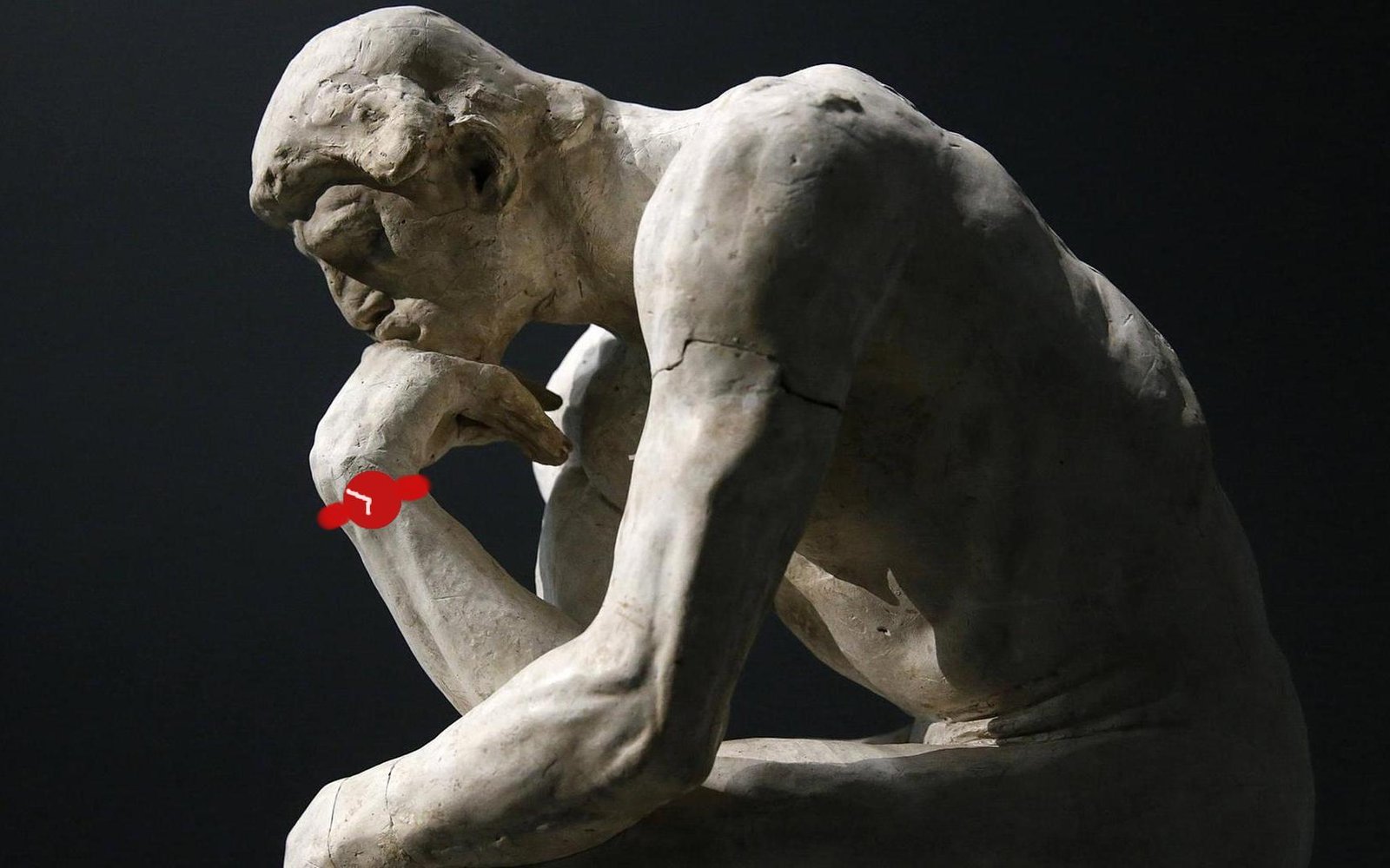 The Thinker sculpture with red vintage watch overlay showing contemplative pose, philosophy of time concept, mechanical timekeeping meets classical art, horology and contemplation symbolism